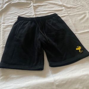 Knee level black comfortable shorts.